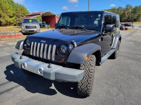 2009 Jeep Wrangler Unlimited for sale at Mathews Used Cars, Inc. in Crawford GA
