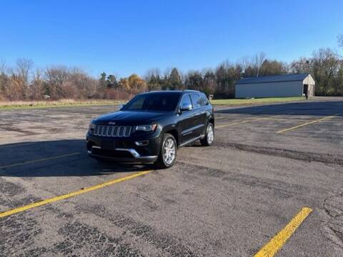 2014 Jeep Grand Cherokee for sale at Caruzin Motors in Flint MI