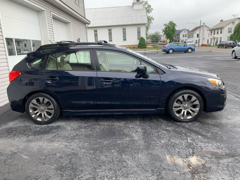 2014 Subaru Impreza for sale at VILLAGE SERVICE CENTER in Penns Creek PA