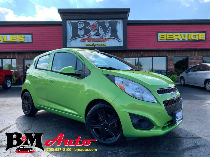 2014 Chevrolet Spark for sale at B & M Auto Sales Inc. in Oak Forest IL
