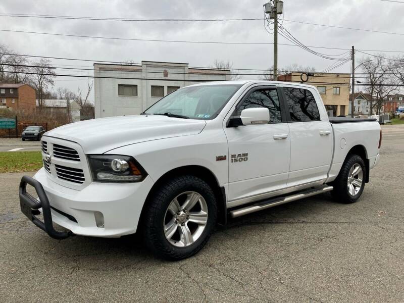 2014 RAM 1500 for sale at STIRLING MOTORS, LLC in Irwin PA