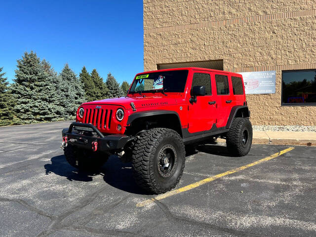 2016 Jeep Wrangler Unlimited for sale at KAYES TRUCKS AND PARTS LLC in West Bend, WI