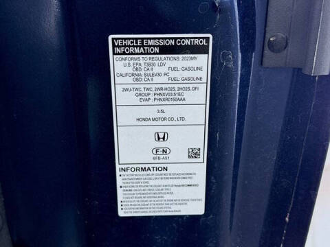 2023 Honda Pilot EX-L w/Rear Captain's Chairs