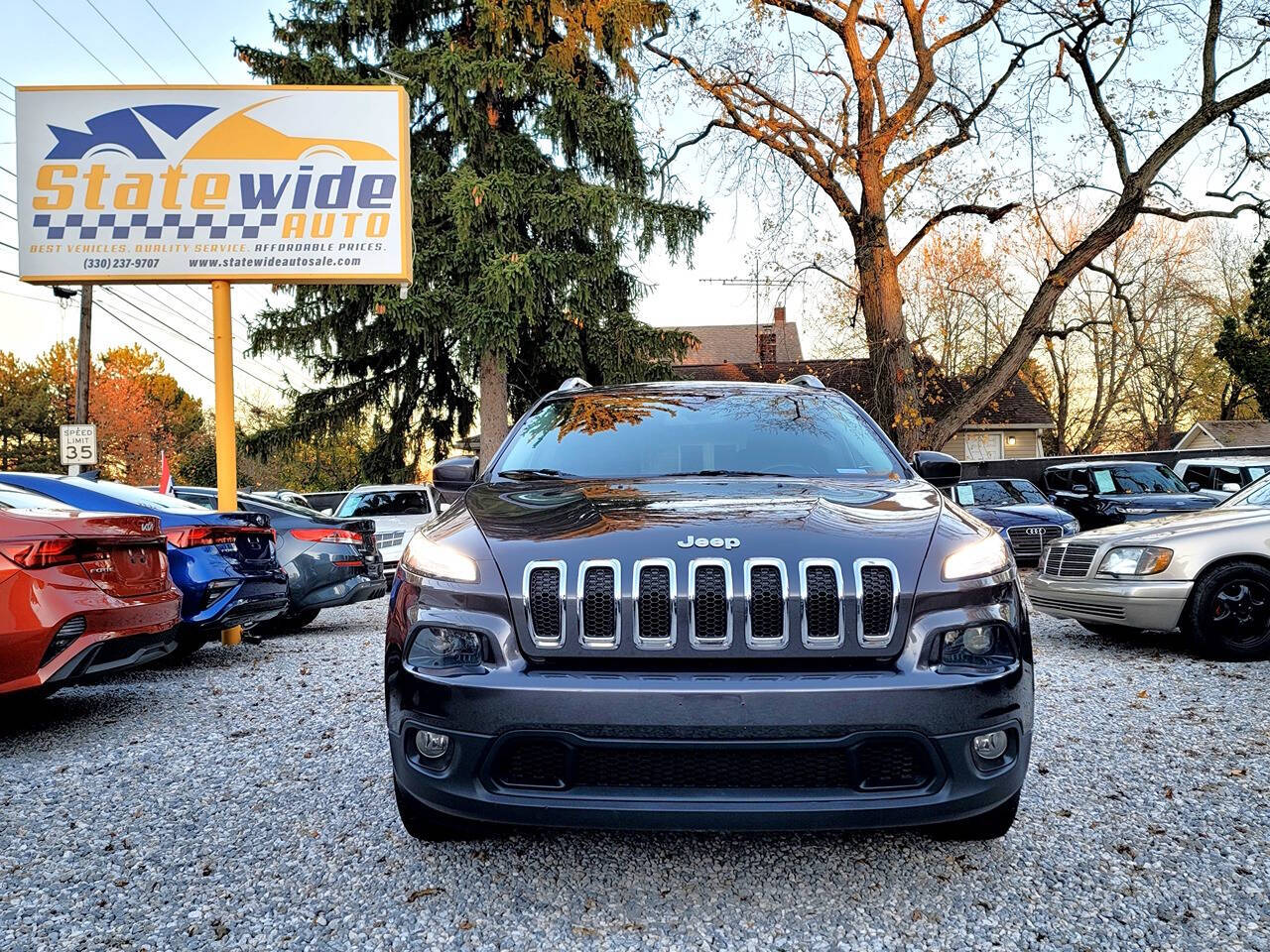 2015 Jeep Cherokee for sale at Statewide Auto LLC in Akron, OH