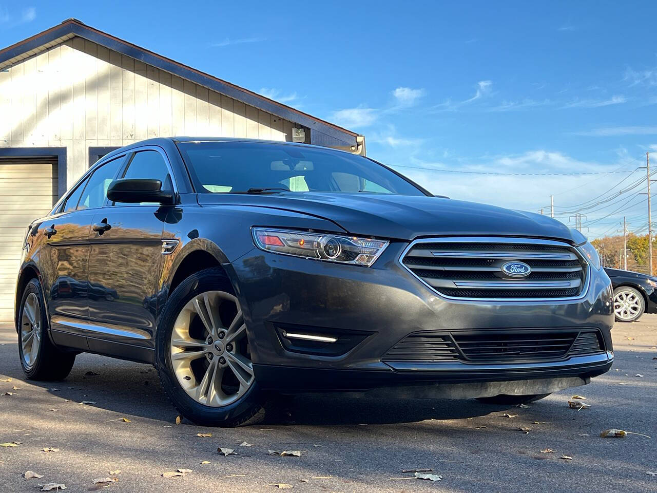 2015 Ford Taurus for sale at Spartan Elite Auto Group LLC in Lansing, MI