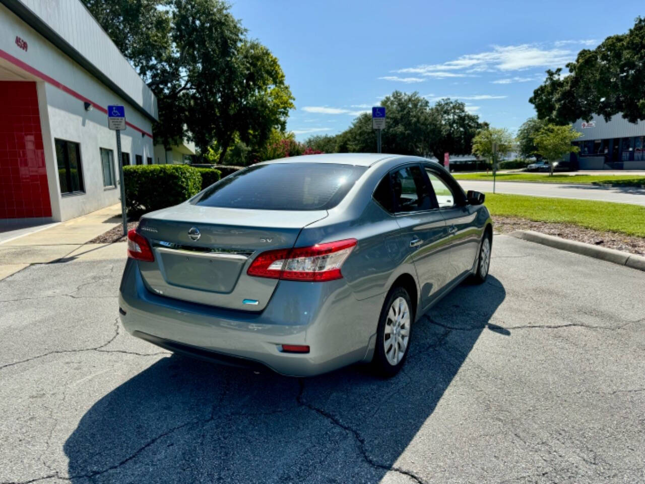 2014 Nissan Sentra for sale at Zoom Auto Exchange LLC in Orlando, FL