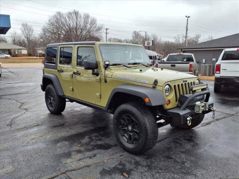 2013 Jeep Wrangler Unlimited for sale at HOWERTON'S AUTO SALES in Stillwater OK