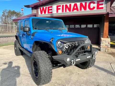 2011 Jeep Wrangler Unlimited for sale at Affordable Auto Sales in Cambridge MN