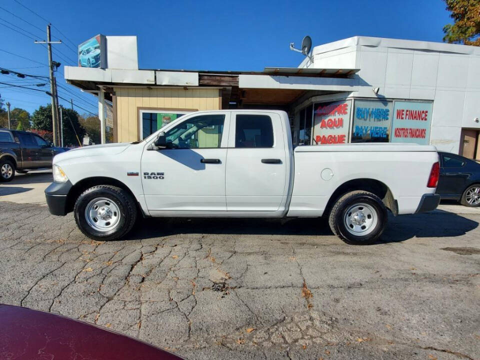 2014 Ram 1500 for sale at DAGO'S AUTO SALES LLC in Dalton, GA