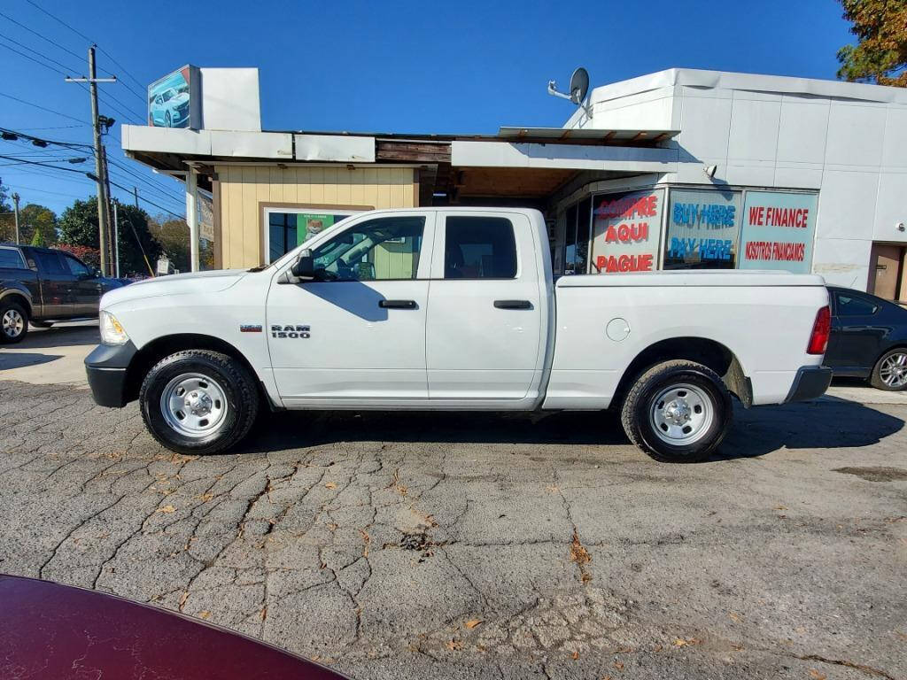 2014 Ram 1500 for sale at DAGO'S AUTO SALES LLC in Dalton, GA