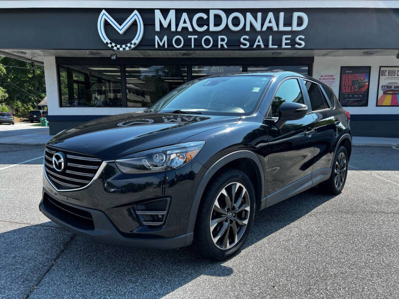 2016 Mazda CX-5 for sale at MacDonald Motor Sales in High Point NC