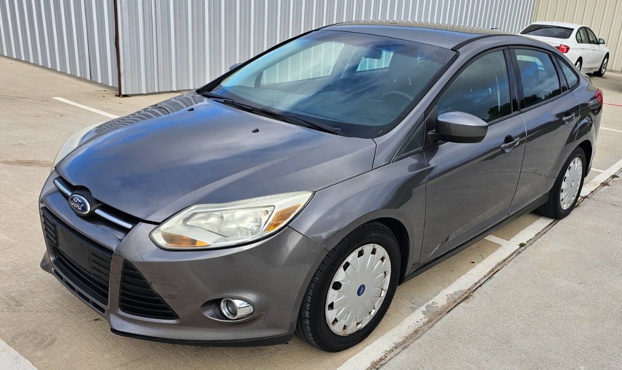 2012 Ford Focus for sale at CAR MARKET AUTO GROUP in Sugar Land, TX