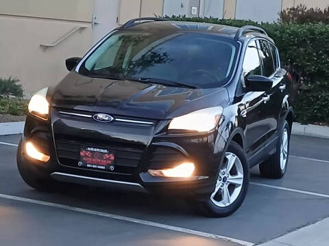 2015 Ford Escape for sale at alfis auto sales in Corona CA