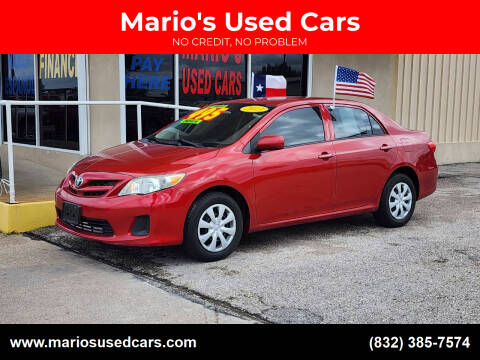 2013 Toyota Corolla for sale at Mario's Used Cars in Houston TX