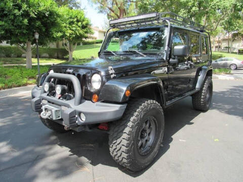2010 Jeep Wrangler Unlimited for sale at E MOTORCARS in Fullerton CA