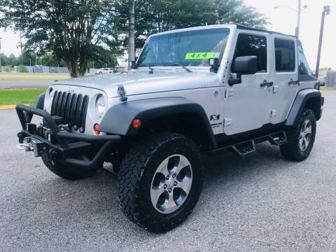 2009 Jeep Wrangler Unlimited for sale at SPEEDWAY MOTORS in Alexandria LA