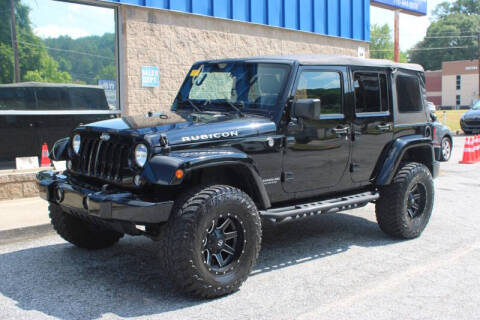 2015 Jeep Wrangler Unlimited for sale at 1st Choice Autos in Smyrna GA