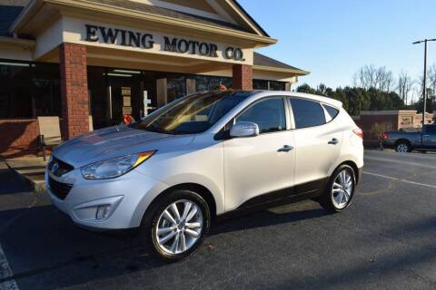 2013 Hyundai Tucson for sale at Ewing Motor Company in Buford GA