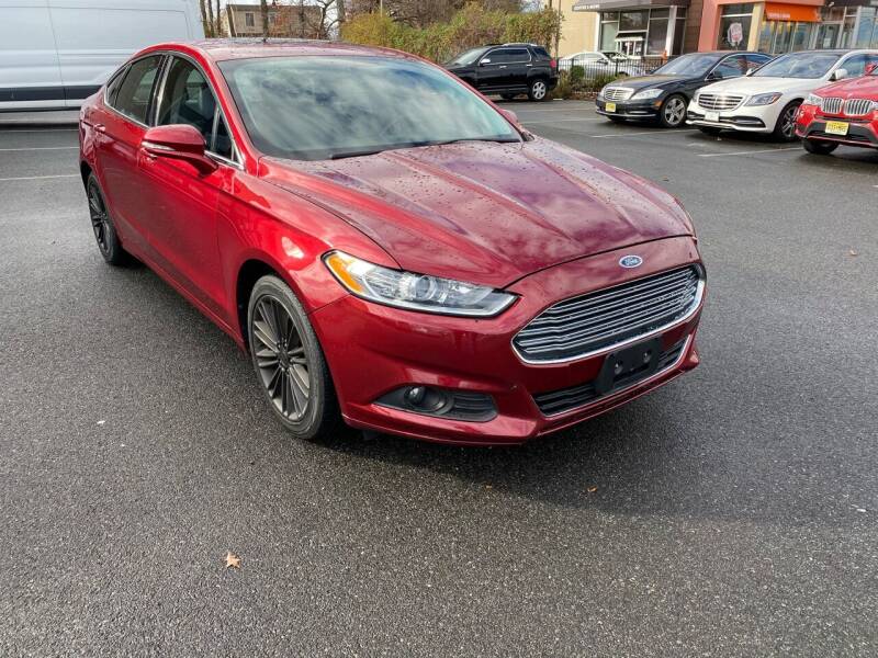 2014 Ford Fusion for sale at MAGIC AUTO SALES in Little Ferry NJ