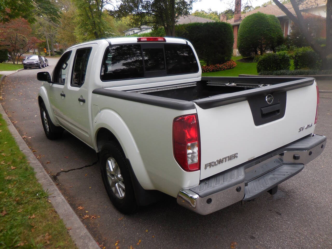 2015 Nissan Frontier for sale at PRESTIGE MOTORS LEASING CORP in Roslyn Heights, NY