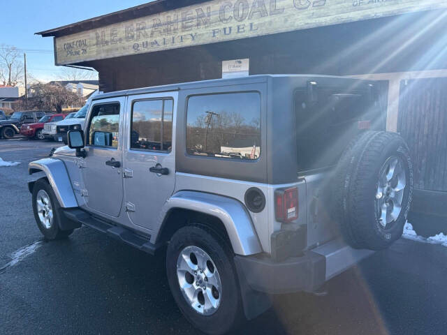 2014 Jeep Wrangler Unlimited for sale at Drive X in Oakville, CT