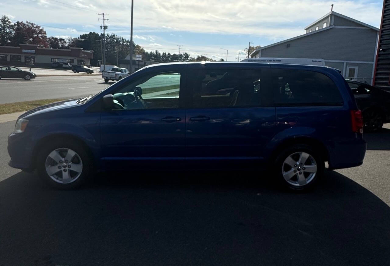 2013 Dodge Grand Caravan for sale at SIGNATURE AUTOS LLC in Weston, WI