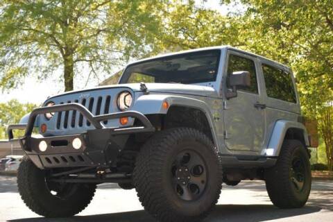2012 Jeep Wrangler for sale at Carma Auto Group in Duluth GA