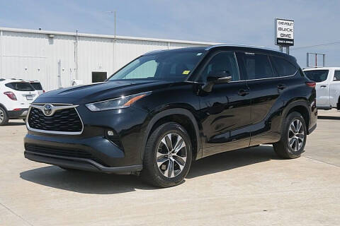 2021 Toyota Highlander for sale at STRICKLAND AUTO GROUP INC in Ahoskie NC
