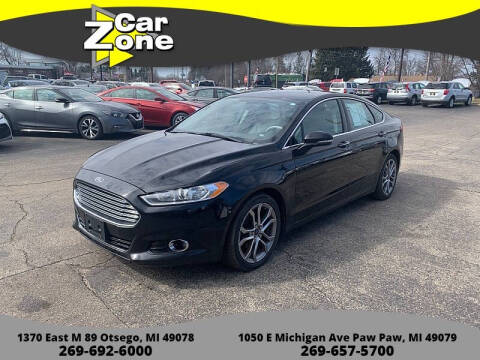 2016 Ford Fusion for sale at Car Zone in Otsego MI