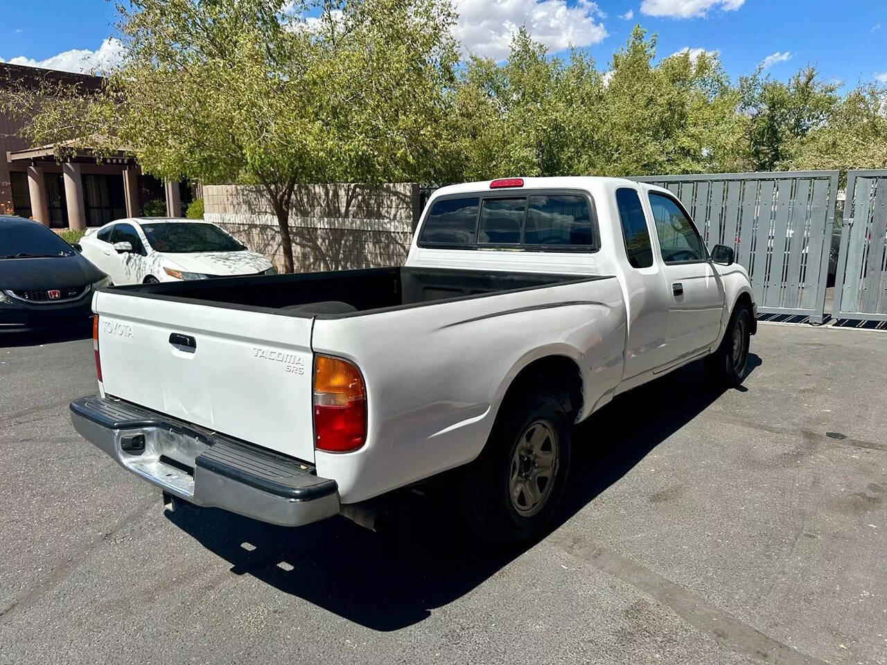 2003 Toyota Tacoma for sale at HUDSONS AUTOS in Gilbert, AZ