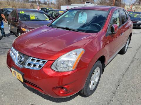 2013 Nissan Rogue for sale at Howe's Auto Sales in Lowell MA