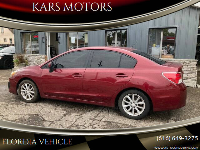 2013 Subaru Impreza for sale at KARS MOTORS in Wyoming MI