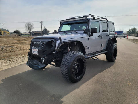 2014 Jeep Wrangler Unlimited for sale at CENCAL AUTOMOTIVE INC in Modesto CA