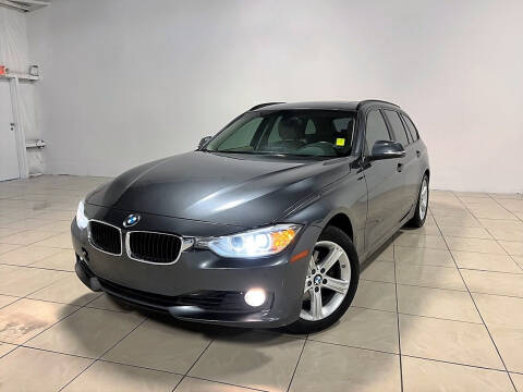 2014 BMW 3 Series for sale at ROADSTERS AUTO in Houston TX