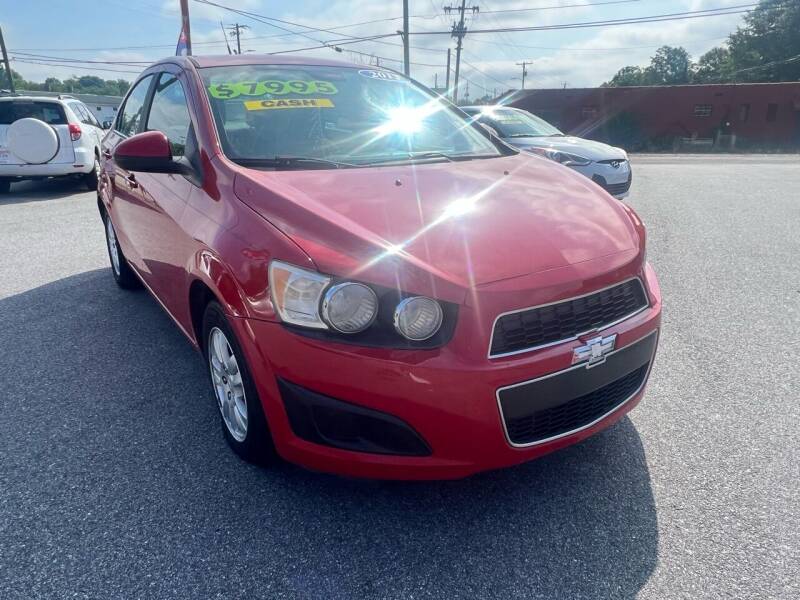 2013 Chevrolet Sonic for sale at Cars for Less in Phenix City AL