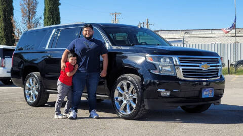 2015 Chevrolet Suburban for sale at BENCOMO MOTORS in El Paso TX