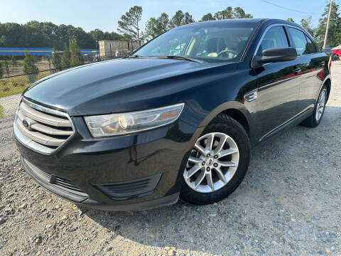 2013 Ford Taurus for sale at Gwinnett Luxury Motors in Buford GA