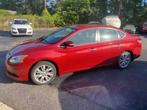 2013 Nissan Sentra for sale at TOP OF THE LINE AUTO SALES in Fayetteville NC