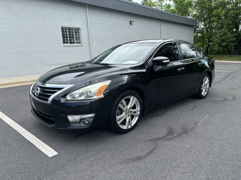 2014 Nissan Altima for sale at Noble Auto in Hickory NC