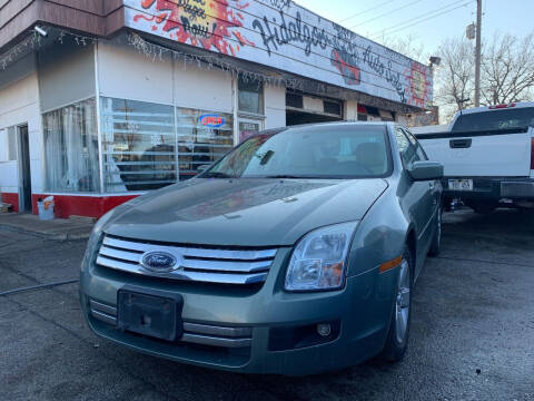 2009 Ford Fusion for sale at HIDALGOS AUTO SALES in Omaha NE