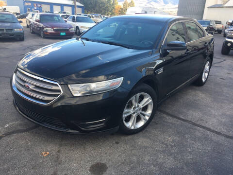 2013 Ford Taurus for sale at R & J Auto Sales in Pocatello ID