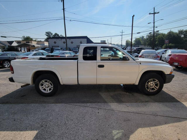 2004 Dodge Dakota for sale at DAGO'S AUTO SALES LLC in Dalton, GA