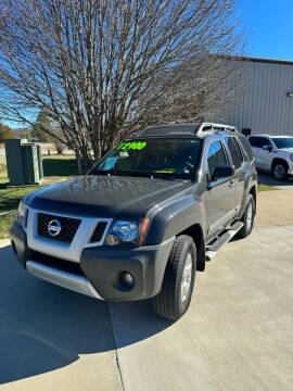 2013 Nissan Xterra for sale at Super Sports & Imports Concord in Concord NC