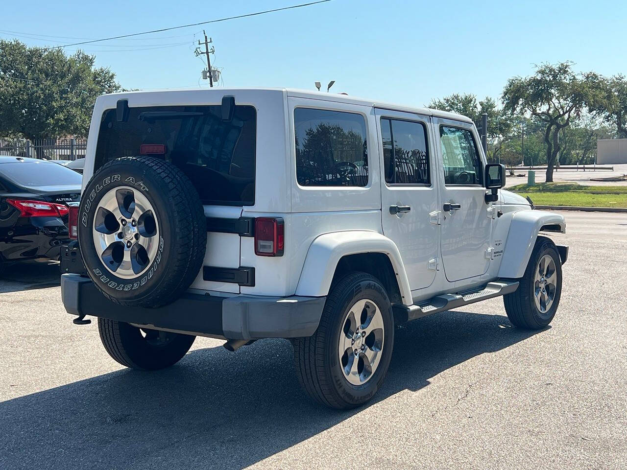 2016 Jeep Wrangler Unlimited for sale at Auto Imports in Houston, TX