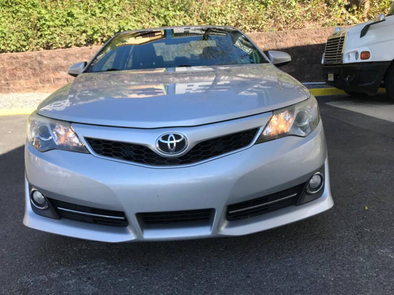 2014 Toyota Camry for sale at Wow Auto Sales Inc in Jersey City NJ