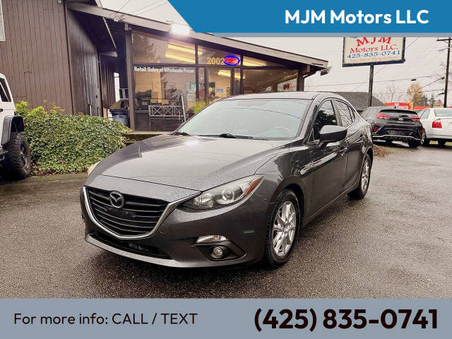 2015 Mazda MAZDA3 i Touring's photo