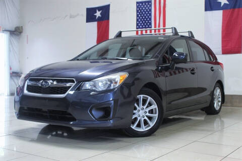 2014 Subaru Impreza for sale at ROADSTERS AUTO in Houston TX