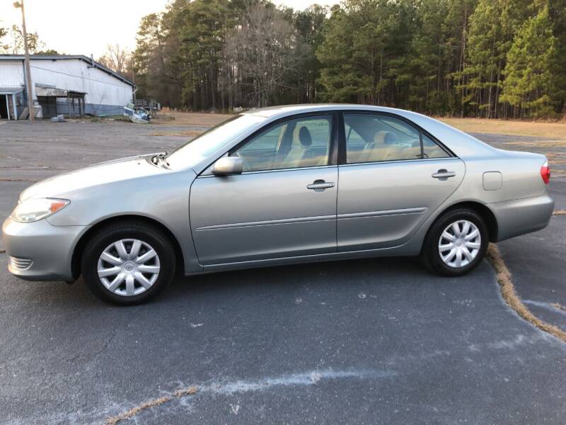 2006 Toyota Camry for sale at Global Autos in Kenly NC