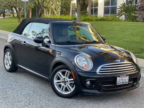 2011 MINI Cooper for sale at MILLENNIUM MOTORS in Van Nuys CA