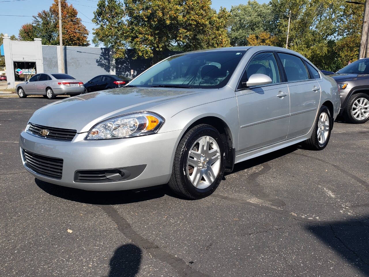 2011 Chevrolet Impala for sale at Auto Shop in Wyoming, MI